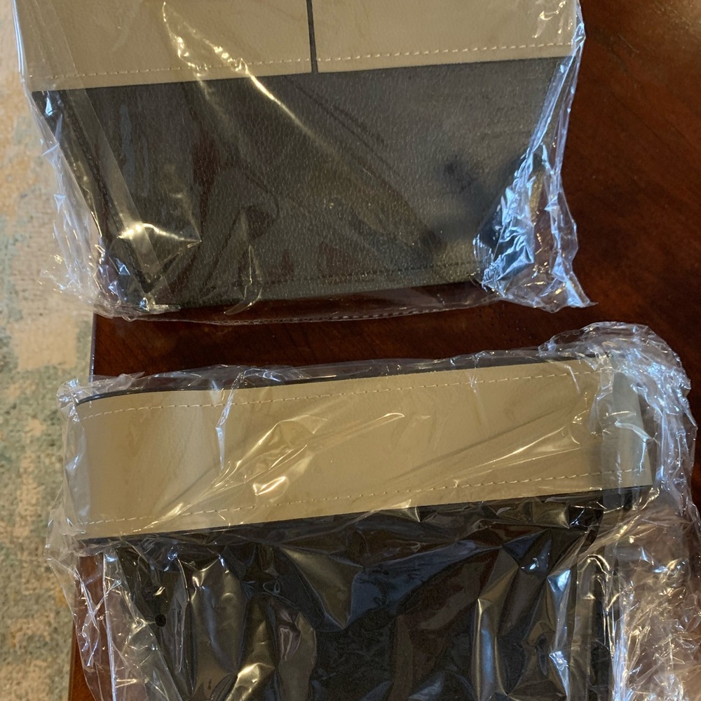 2 Car Seat Gap Filler Organizers with cup holder. Brand new still in packaging.